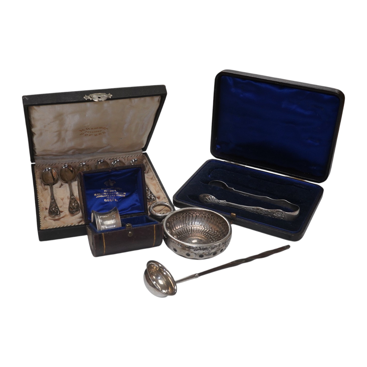 A French 800 standard white metal taste vin, 11cm, together with a George III silver toddy ladle, London, 1799, a cased set of six Art Nouveau silver coffee spoons by William Hutton & Sons and two incomplete cased silver